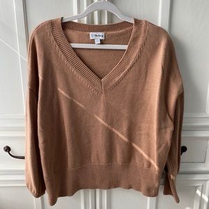 Tan V-neck sweater